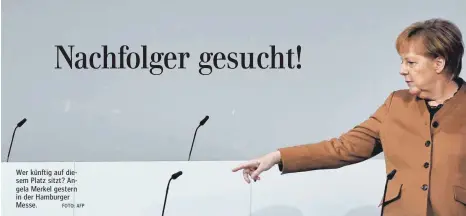  ?? FOTO: AFP ?? Wer künftig auf diesem Platz sitzt? Angela Merkel gestern in der Hamburger Messe.