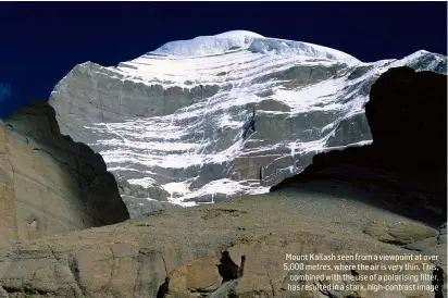  ??  ?? Mount Kailash seen from a viewpoint at over 5,000 metres, where the air is very thin. This,
combined with the use of a polarising filter,
has resulted in a stark, high-contrast image