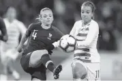  ?? DAVID VINCENT AP ?? Mallory Pugh, right, vies with France’s Marion Torrent to score the U.S. goal in a 3-1 loss to France.