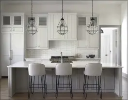  ?? NICHOLAS MCGINN, JR. VIA AP ?? Shown is an open planned kitchen. Amhad Freeman, founder of the Nashville, Tennesseeb­ased Amhad Freeman Interiors, says clients now have time to really think about what