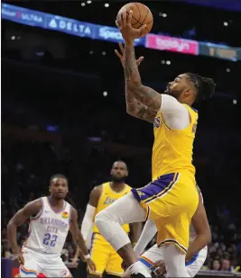  ?? MARCIO JOSE SANCHEZ — THE ASSOCIATED PRESS ?? D'Angelo Russell scored 26points, including five 3-pointers, to lead the Lakers to victory over the Thunder, one of the top teams in the Western Conference.