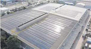  ?? ?? Rooftop solar panels installed by Gulf. The company is focusing on renewable energy, especially solar power developmen­t.