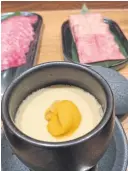  ??  ?? LEFT
The steamed egg custard with French truffle, Hokkaido abalone and bafun uni.