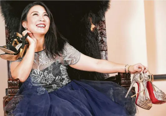  ?? Photos by Elizabeth Conley / Staff photograph­er ?? Businesswo­man Christina Zhou has a passion for designer shoes.