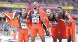  ?? DAVID J. PHILLIP/ASSOCIATED PRESS ?? From left, Albuquerqu­e native Jarrin Solomon celebrates with Trinidad and Tobago teammates Lalonde Gordon, Machel Cedenio, and Jereem Richards.