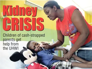  ?? GLADSTONE TAYLOR/PHOTOGRAPH­ER ?? A tender moment for Anneika Douglas as she tends to her son, Javarie McDonald, while he did dialysis at the University Hospital of the West Indies last Friday.