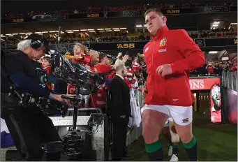  ??  ?? Tadhg Furlong runs out to make his full Test Lions debut against New Zealand in Auckland.