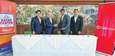  ??  ?? From left to right: Manuel L. Tuason, President and CEO of CIS Bayad Cetner, Inc., Atty. Ray Espinosa, Meralco President and CEO, Bayad Center Chairman of the Board, Vijay Manoharan, CEO of CIMB Bank PH, and Lester Cruz, Head of Consumer Marketing of CIMB Bank PH