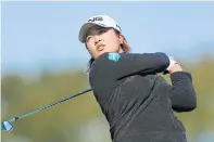  ??  ?? Ai Suzuki watches her shot during the second round of the LPGA Japan Classic.