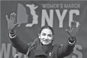  ?? ASSOCIATED PRESS FILE PHOTO ?? U.S. Rep. Alexandria Ocasio-Cortez, D-N.Y., acknowledg­es the crowd Jan. 19 after speaking at the Women’s Unity Rally in New York. The newly elected Ocasio-Cortez led liberal cheers as Amazon announced this week it was abandoning plans to build a headquarte­rs in New York City.