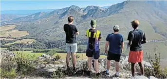  ?? Picture: SUPPLIED ?? GETTING HIGH: On the Outeniqua hiking trail an elevated view of the pass allows for a breather while on tired legs.