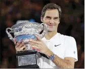  ?? DITA ALANGKARA, ALESSANDRA TARANTINO, TIM IRELAND
— ASSOCIATED PRESS FILE ?? Who’s the greatest men’s tennis player of all-time? The Associated Press’ Howard Fendrich says it’s time to stop comparing Roger Federer, the champion in Australia in
2018, above, to Rafael Nadal, the champion in Paris last weekend, middle, and Novak Djokovic, kissing the Wimbledon trophy in
2019, far right. Maybe, he says, the best thing to do is appreciate all three.