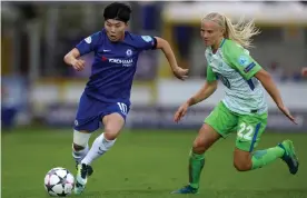  ??  ?? Current teammates Ji So-yun and Pernille Harder were on opposing sides in 2018. Photograph: Adam Holt/Reuters