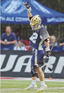  ?? STAFF PHOTO BY STUART CAHILL ?? MAKING HIS POINT: Team MLL’s Kevin Rice celebrates his goal against Team USA in the MLL All-Star Game last night at Harvard Stadium.