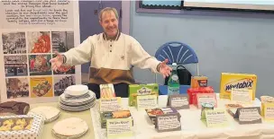  ??  ?? ● PEP volunteer Michael Hiluta at a Food Share/Jacob’s Join event at Haslingden Primary School to promote Taste of Rossendale