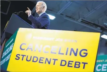  ?? Evan Vucci Associated Press ?? PRESIDENT BIDEN addresses student loan debt this month in Madison, Wis. Those with federally backed student loans from private banks can have some or all debt forgiven. The deadline for qualifying is Tuesday.
