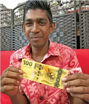  ?? Photo: Shratika Naidu ?? Shahil Deo in Labasa on June 9, 2022, with the $100 unemplymen­t assistance he received from Government.