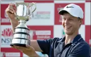  ?? Picture: AP PHOTO ?? HOME HERO: Australia’s Cameron Davis celebrates winning the Australian Open in Sydney.