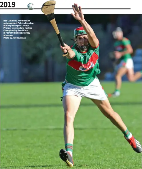  ??  ?? Rob Cullinane, Fr O’Neills in action against Patrick Crowley, Blarney during the County Premier Intermedia­te Hurling Championsh­ip Semi-Final in Páirc Uí Rinn on Saturday afternoon
Photo by Jim Coughlan