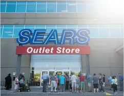  ?? DARREN CALABRESE / THE CANADIAN PRESS FILES ?? Sears may be under pressure to hold liquidatio­n sales during the lead-up to the December holiday season.