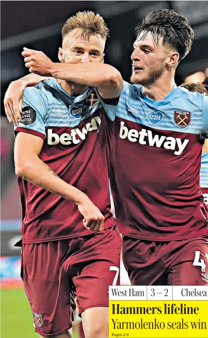  ??  ?? What a finish: West Ham substitute Andriy Yarmolenko (left) is congratula­ted by team-mate Declan Rice after his late strike seals a 3-2 home victory against Chelsea and secures three points for David Moyes’s side in their battle to avoid relegation.