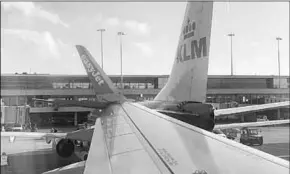  ??  ?? Photograph­s show the easyJet aircraft’s wing appeared to be lodged on the stabiliser­s at the tail of the KLM plane. (Photo: The Guardian)