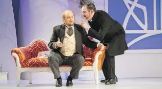  ?? DAVID COOPER ?? Peter McGillivra­y, left, as Dr. Bartolo and Clarence Frazer as Figaro in The Barber of Seville.