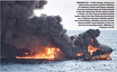  ??  ?? BURNING OUT – In this Sunday, January 14, 2018 photo provided by China's Ministry of Transport, smoke and flames emanate from the burning Iranian oil tanker Sanchi in the East China Sea off the eastern coast of China. The fire from the sunken Iranian...