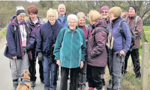  ??  ?? ●●Betty Hurst (centre front) with members of the Littleboro­ugh and Milnrow Over-50s Walking Group