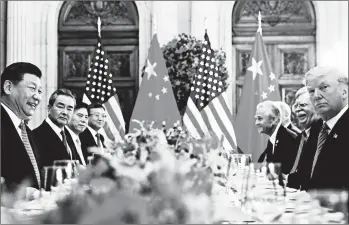  ?? PABLO MARTINEZ MONSIVAIS/AP ?? Chinese leader Xi Jinping, left, and President Donald Trump’s dinner came amid a trade dispute between the two nations.