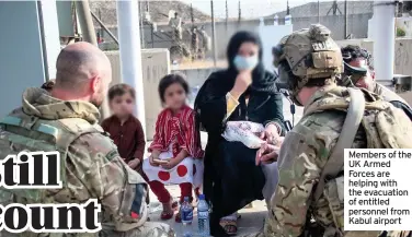  ??  ?? Members of the UK Armed Forces are helping with the evacuation of entitled personnel from Kabul airport