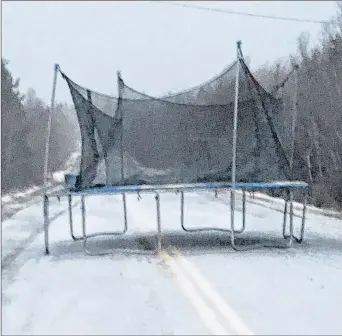 ?? SUBMITTED ?? Thomas Fraser took this photo of a trampoline that had blown into the middle of the road on Hardwood Hill Road in Scotsburn last Friday.