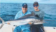  ??  ?? TOP CATCH: Darcy Flower was happy to land his first black marlin on a skipping garfish at Oyster Reef off Cairns last weekend.