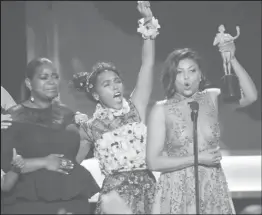  ?? REUTERS/Mike Blake ?? Octavia Spencer (L), Janelle Monae (2nd L) and Taraji P. Henson accept their award for Cast in a Motion Picture for ‘Hidden Figures’ during the 23rd Screen Actors Guild Awards.