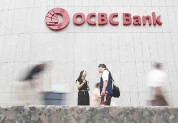  ??  ?? OCBC says elsewhere, inflation continued to moderate further given the decline in domestic fuel prices, and is expected to moderate further into the year given diminishin­g cost-push drivers. — Reuters photo