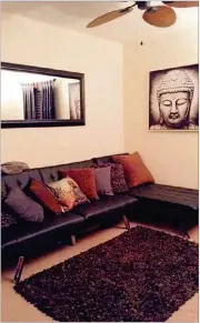  ?? MICHELLE JACKSON ?? Buddhas are displayed prominentl­y in Michelle Jackson’s Atlanta home because of their calming quality, she said.
