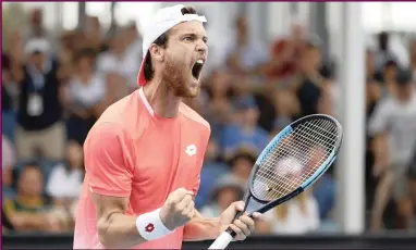  ??  ?? Joao Sousa of Portugal celebrates winning his round two men’s singles match against Philipp Kohlschrei­ber of Germany at the Australian Open Grand Slam tennis tournament in Melbourne.PICTURES: EPA-EFE/AFRIAN NEWS AGENCY (ANA)