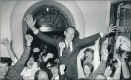  ?? PICTURE: INDEPENDEN­T NEWSPAPERS ARCHIVE/UCT ?? Progressiv­e Federal Party victor Ken Andrew, cheered by supporters in 1987, the election in which the PFP lost official opposition status to the Conservati­ve Party.