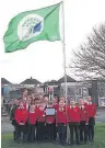  ??  ?? The eco flag on display at West Park pPrimary