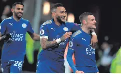  ??  ?? Goal machine: Jamie Vardy celebrates after opening the scoring