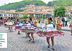 ??  ?? RHYTHM SECTION
Schoolchil­dren dance in Cusco, the ancient Inca capital