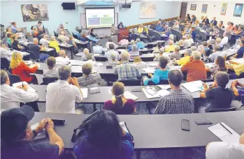  ?? JIM THOMPSON/JOURNAL ?? People packed the public meeting held Tuesday by both the Environmen­t and the Energy, Minerals and Natural Resources department­s at UNM Law School to discuss new methane emissions regulation­s.