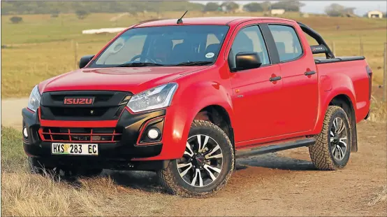  ??  ?? BEAUTIFUL BEAST: The Isuzu KB 250 X-Rider 4x2 Double Cab, which displays superb road-holding ability in its ‘Pull Me Over Red’ guise