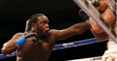  ?? STEPHEN DUNN/GETTY IMAGES FILE PHOTO ?? Canadian Bermane Stiverne — landing a shot against Chris Arreola in 2014 — fights for a world title on Nov. 4, the same night as UFC 217.