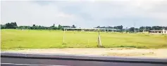  ??  ?? The fenced makeshift hockey field in Kampong Sentosa, Salim.