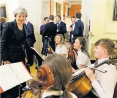  ??  ?? Fine tunes Mrs May was so appreciati­ve of the AFO