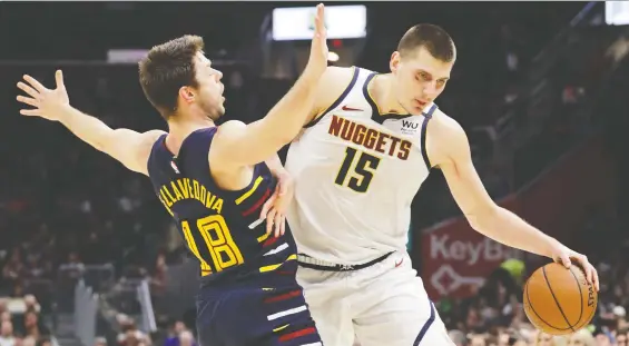  ?? TONY DEJAK/THE ASSOCIATED PRESS FILES ?? Denver Nuggets centre Nikola Jokic is one of a three star athletes to have been reported to have tested positive for COVID-19 in recent days.