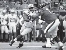  ?? ERIC CHRISTIAN SMITH AP ?? Tank Carradine rushes against Texans offensive guard Jeff Allen during a game in 2017. Carradine was a second-round pick of the 49ers out of Florida State in the 2013 draft.