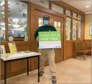  ?? COURTESY GROWING PLACES ?? Department of Conservati­on & Recreation Forester Jason Brown at the Growing Places Arbor Day event at Leominster Public Library on April 29. Brown is one of the foresters working on the Greening the Gateway Cities program in Leominster and Fitchburg.