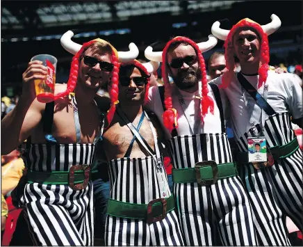  ?? GETTY IMAGES ?? Four French fans don some interestin­g apparel for yesterday’s game against Australia.